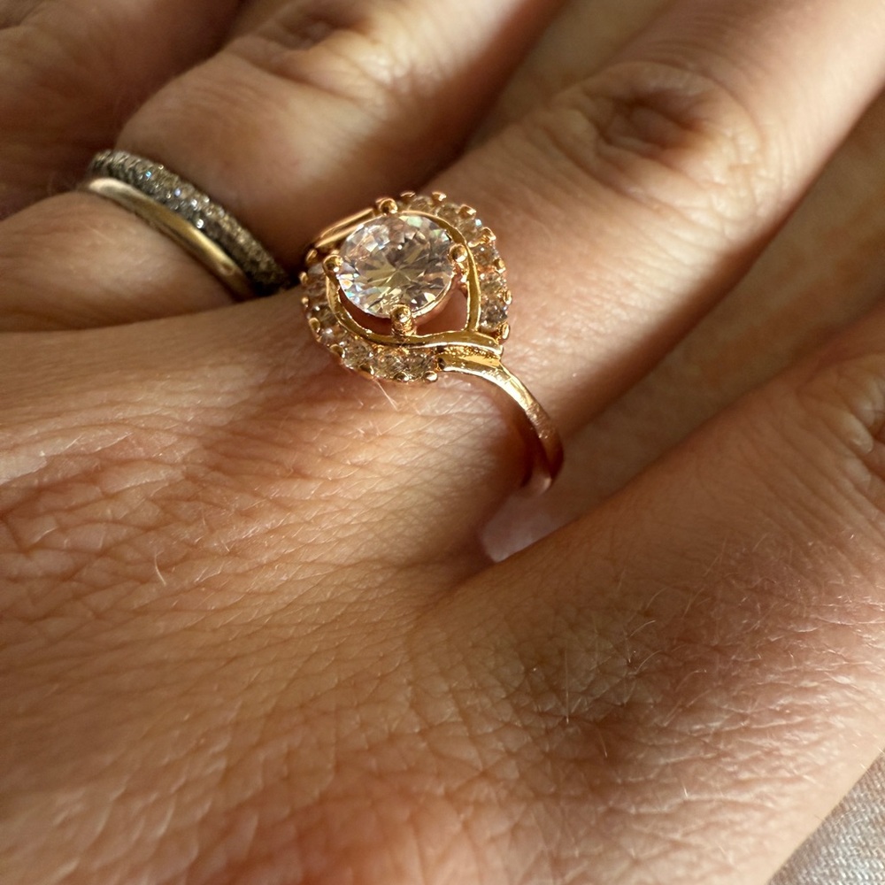Rose Gold Ring with Sparkling Gemstone Halo